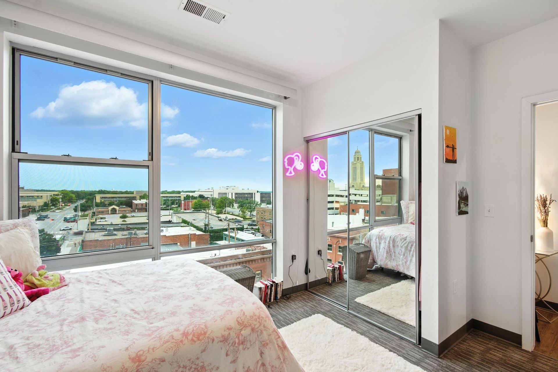 bedroom with large windows and natural light