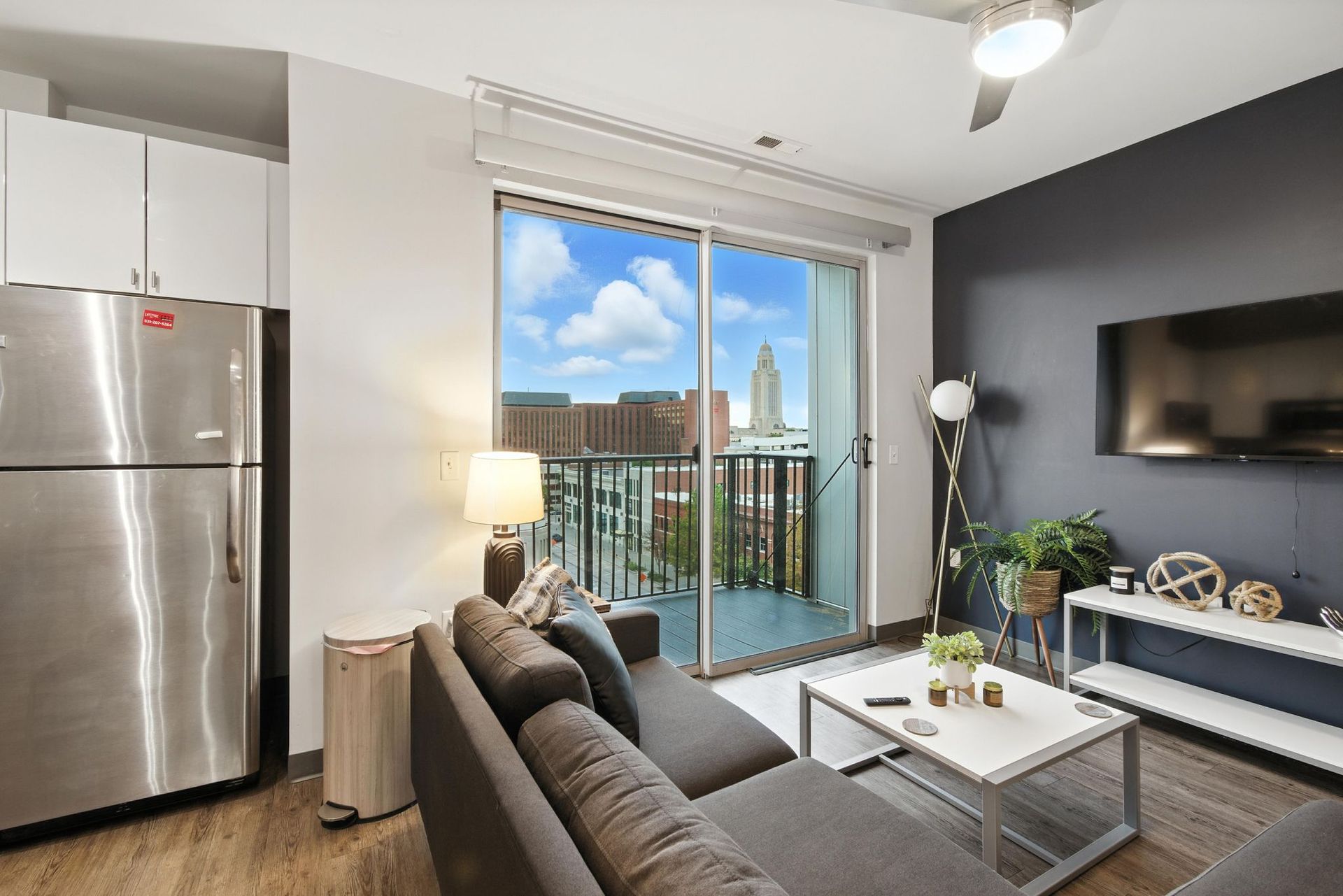 apartment balcony off the living room with views of downtown