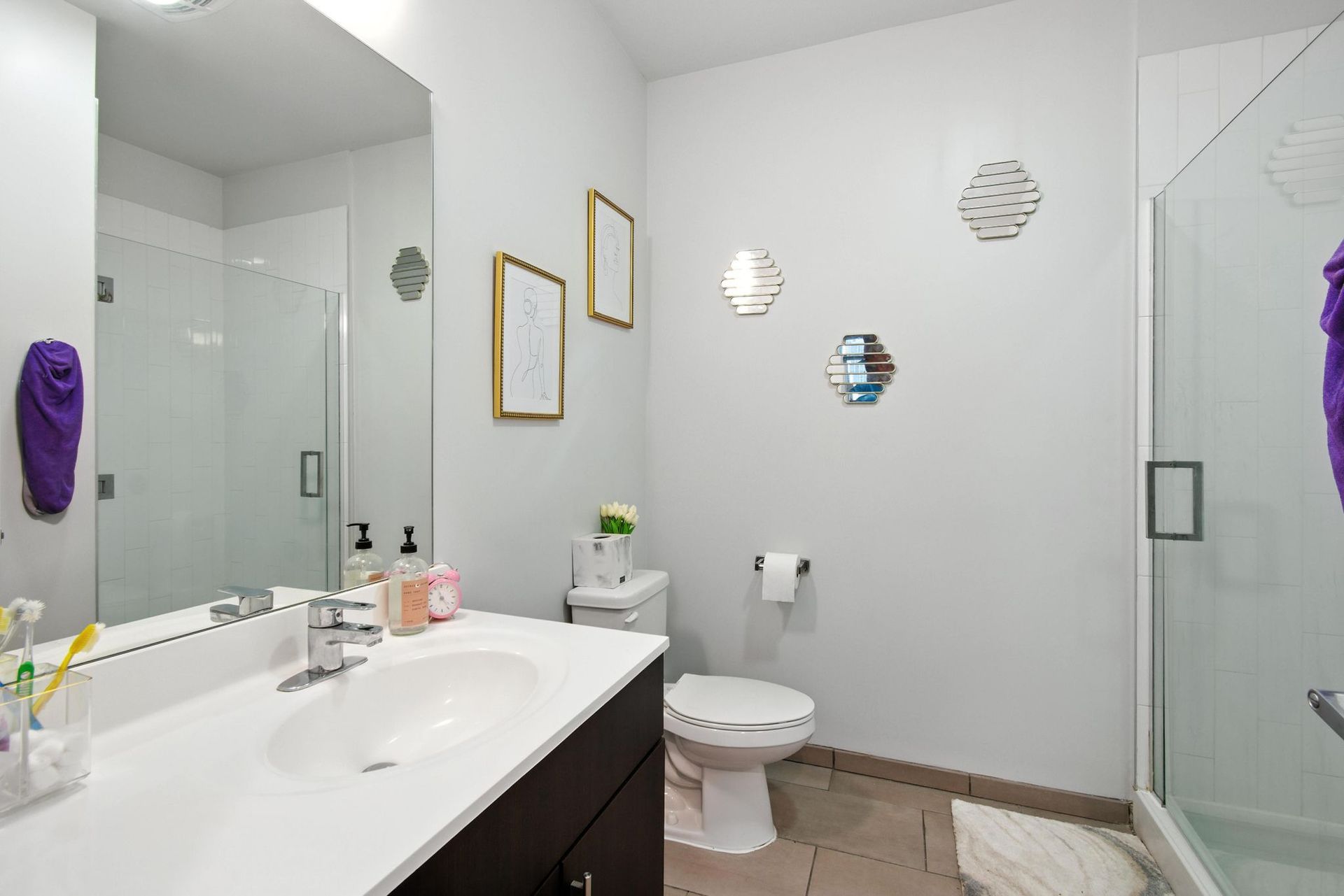 sink and shower in bathroom