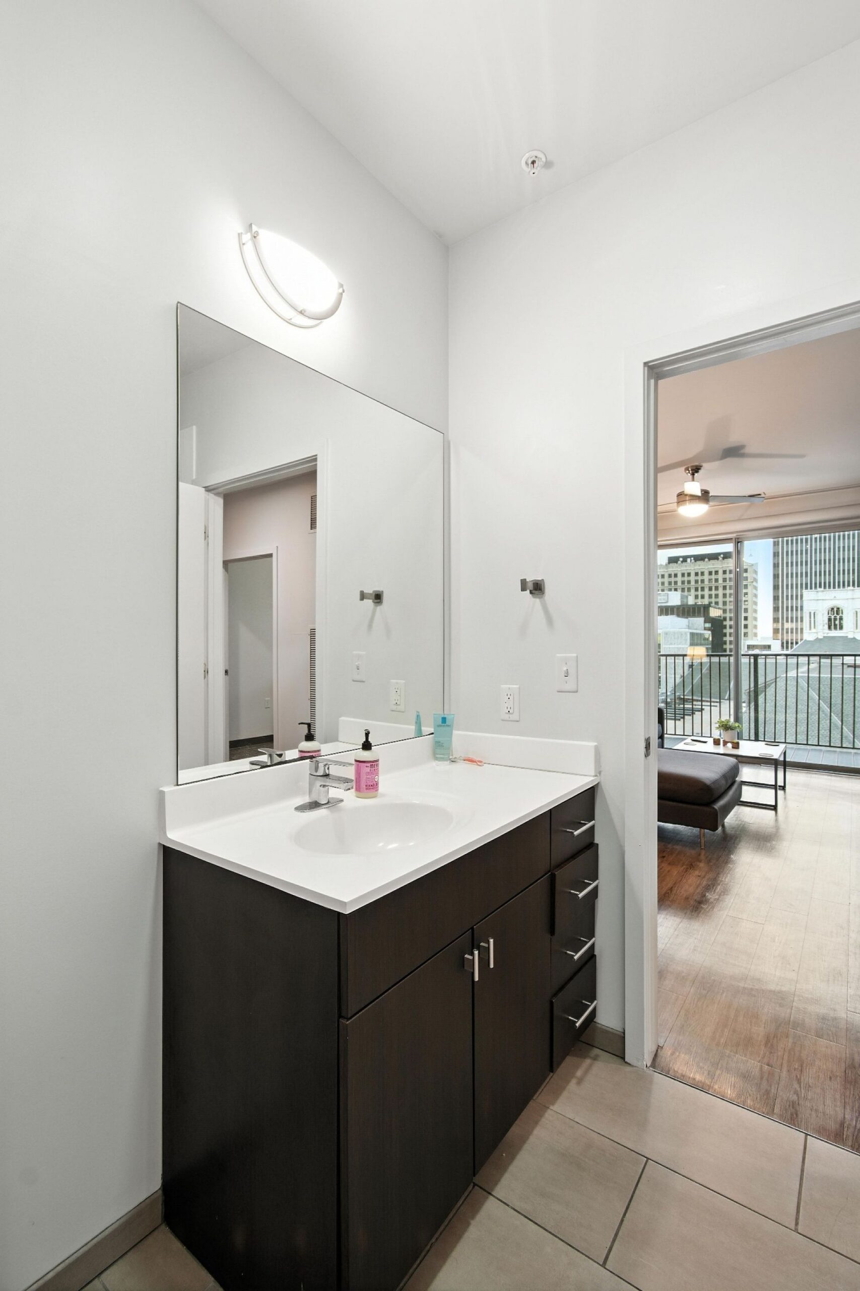 apartment bathroom with vanity