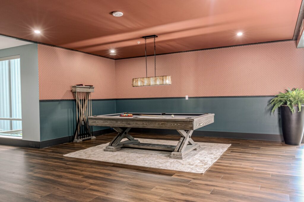 Pool table in the game room at Latitude Lincoln