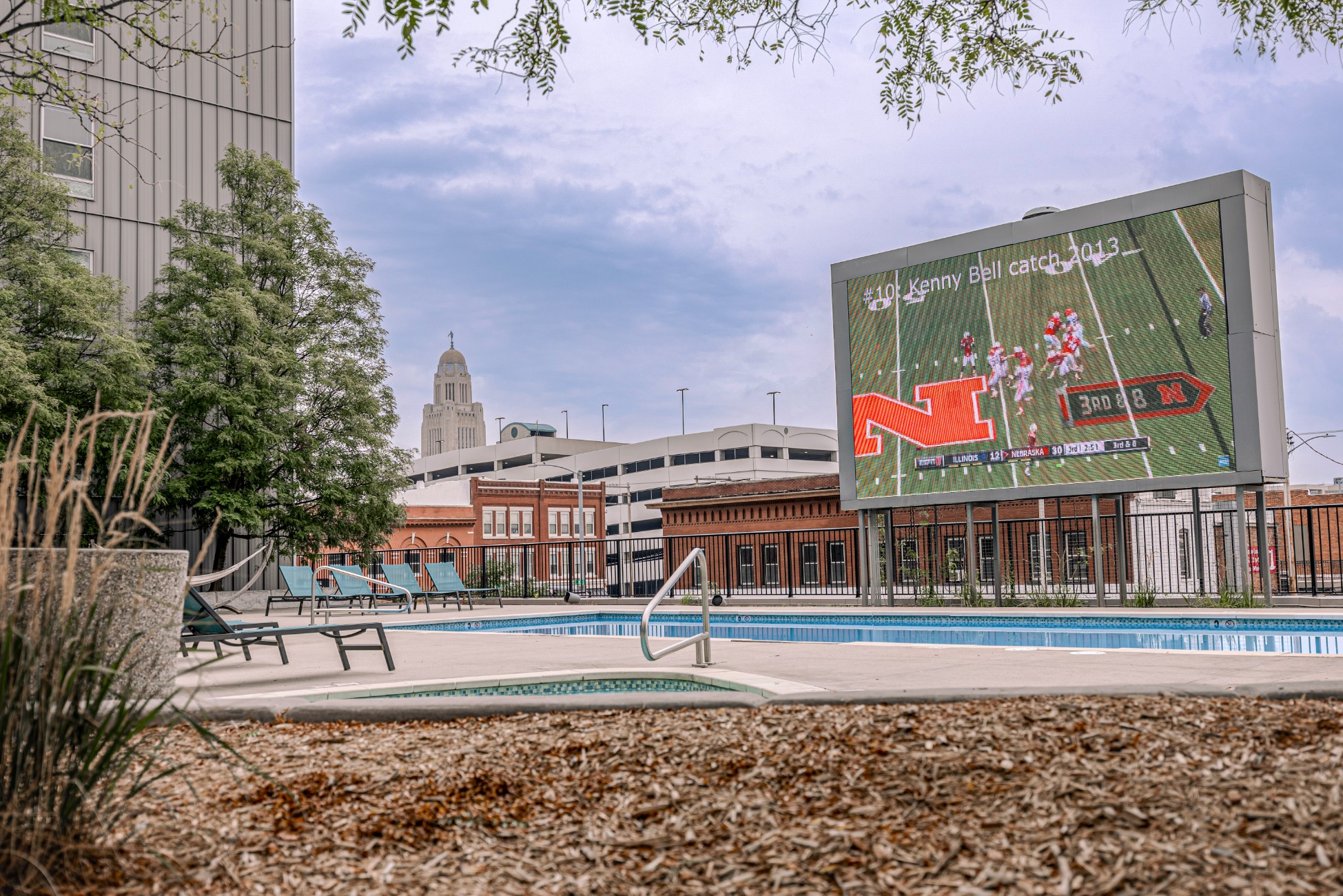 Swimming pool and jumbotron TV for game day